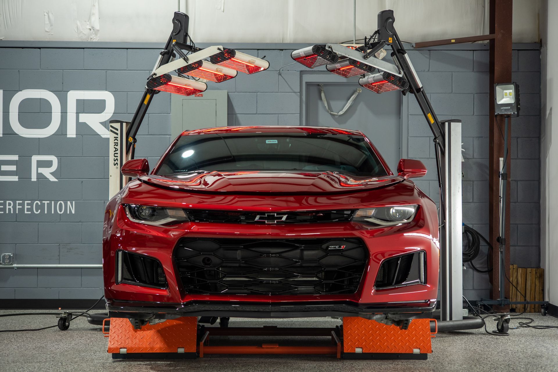 Chevrolet Camaro ZL1 Modesta Ceramic Coating on paint, wheels, and brake calipers and Xpel Paint Protection Film to Front Bumper and Rear Splash front end view Orlando
