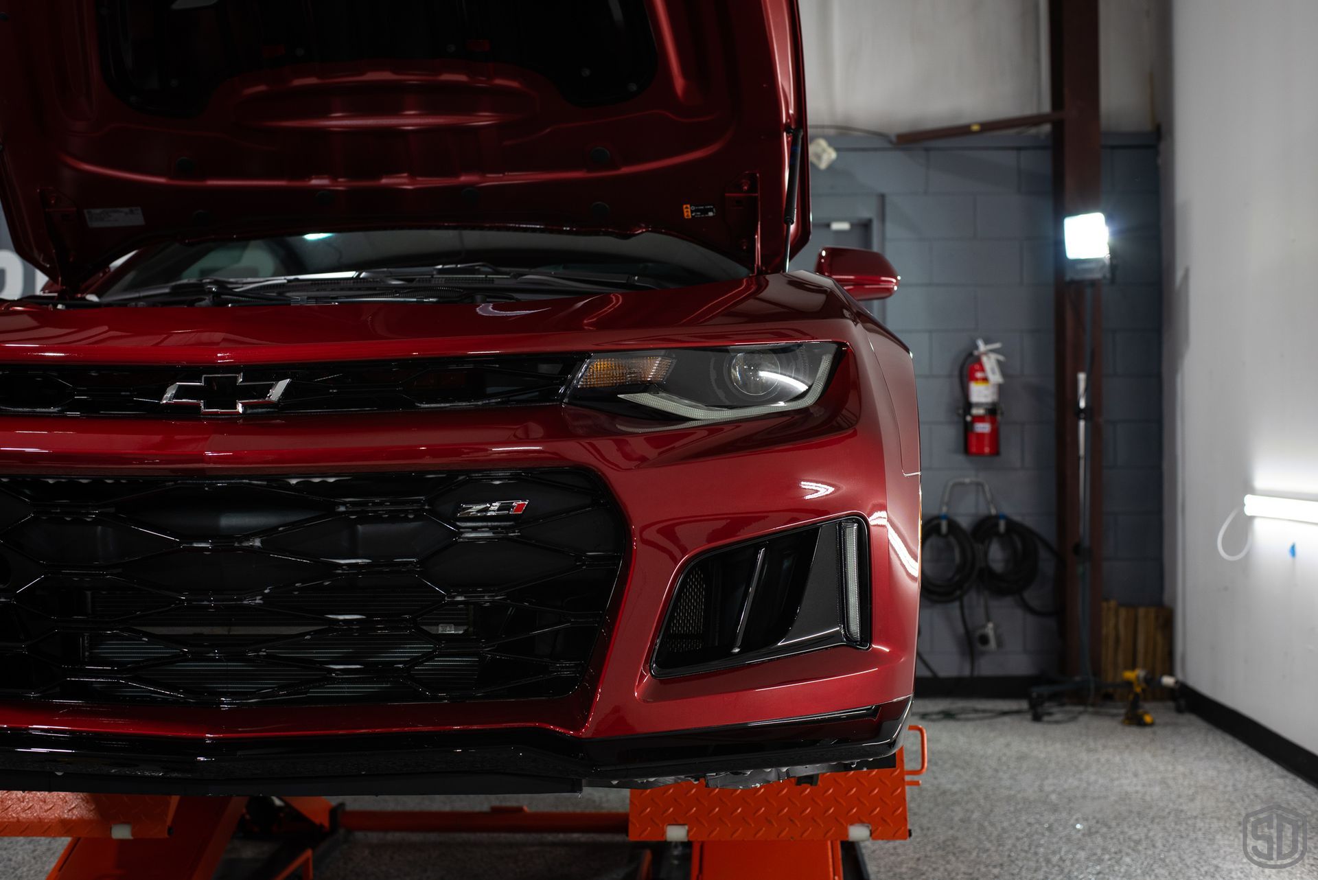 Chevrolet Camaro ZL1 Modesta Ceramic Coating on paint, wheels, and brake calipers and Xpel Paint Protection Film to Front Bumper and Rear Splash after Florida