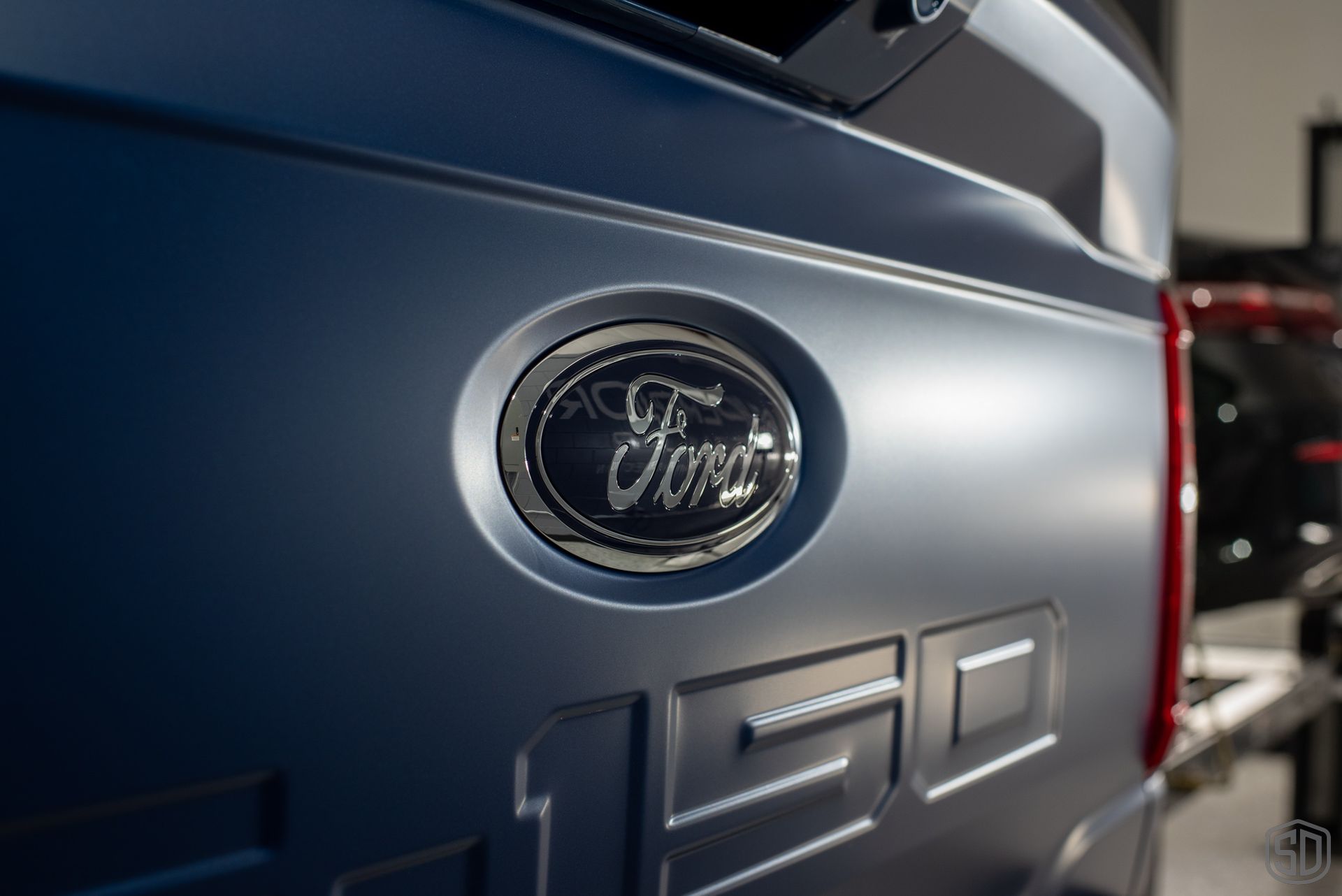 Ford F-150 XLT Supercrew Xpel Matte Paint Protection Film rear emblem close up Orlando, Florida