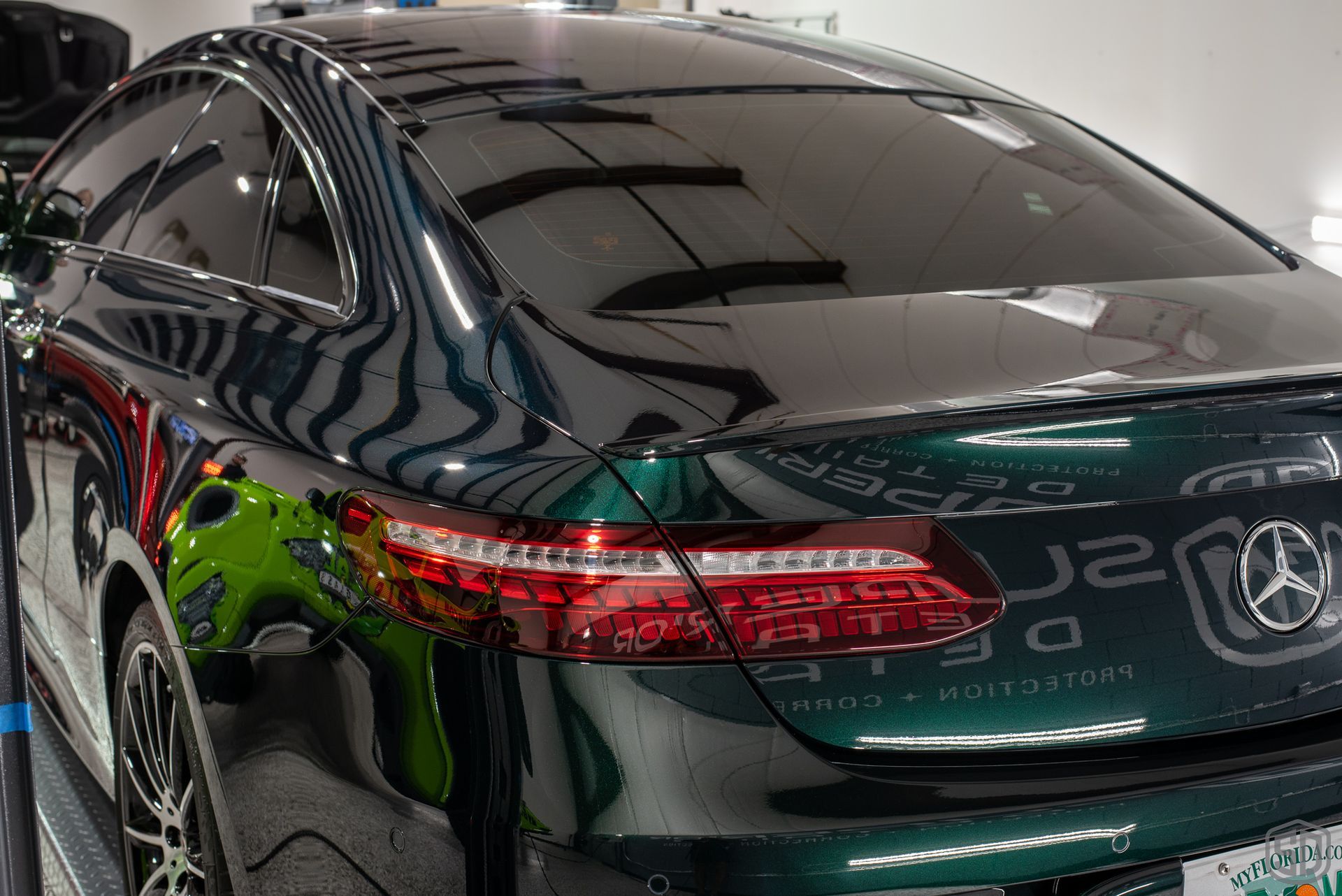 Mercedes-Benz E450 Modesta BC-04 on the Paint and Modesta BC-06 on the Wheels taillight close up Orlando, FL