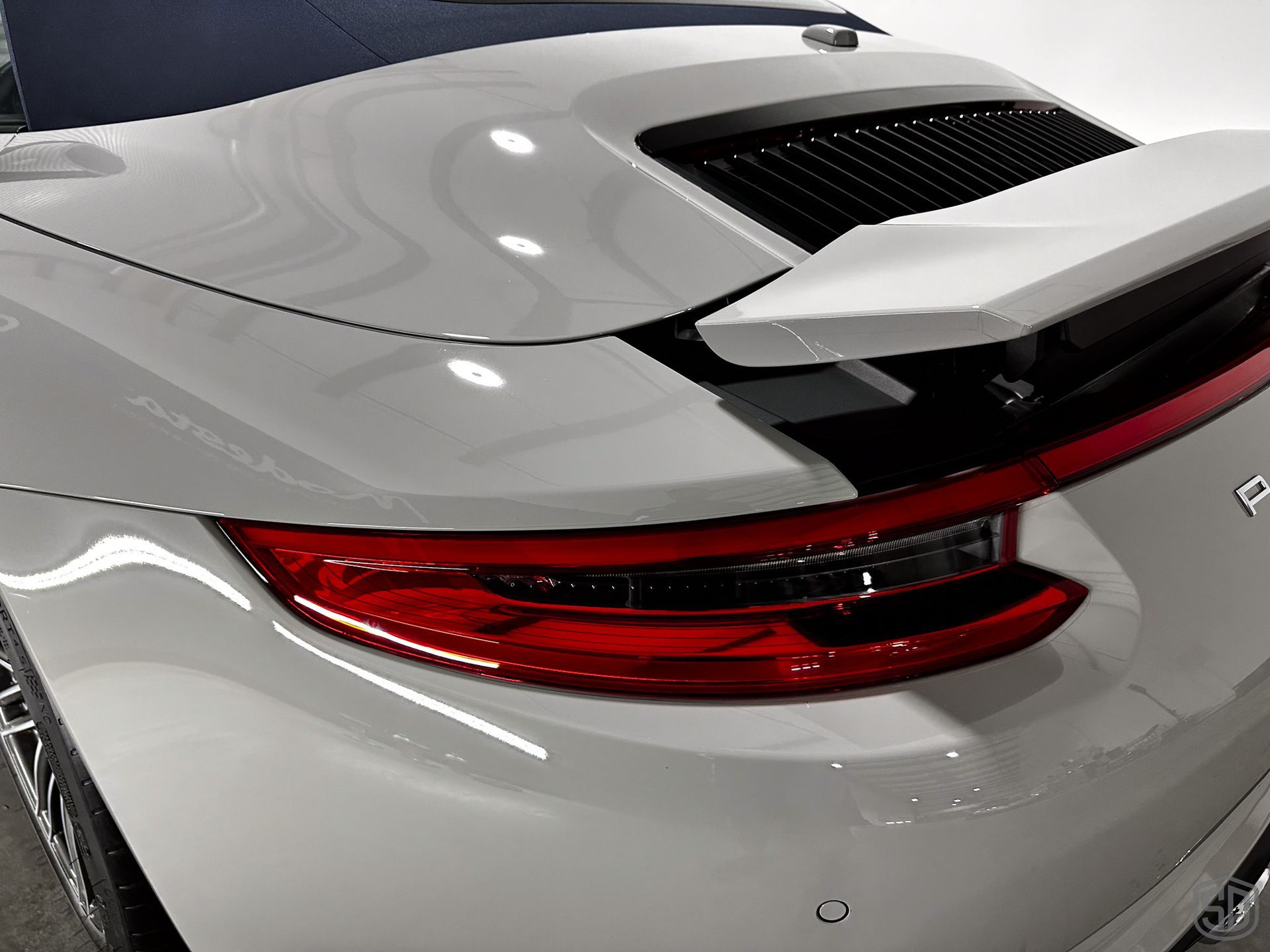 Porsche 911 Carrera Cab 4S Complete Detail and Modesta Ceramic Coating Maintenance rear view close up Orlando, FL 