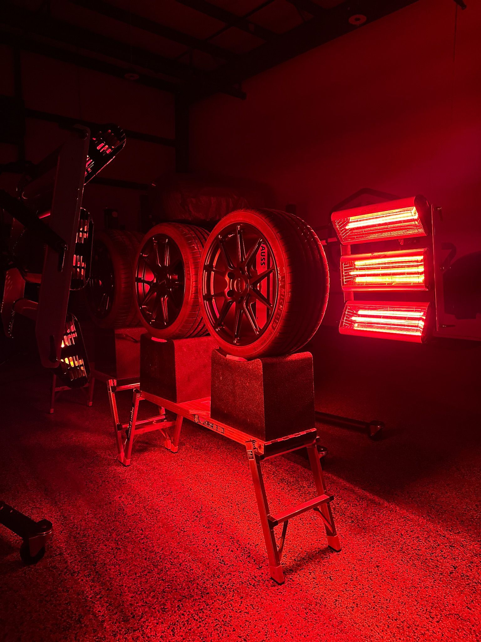 A close up of tires with BC-06 being cured to it via IR lamp.