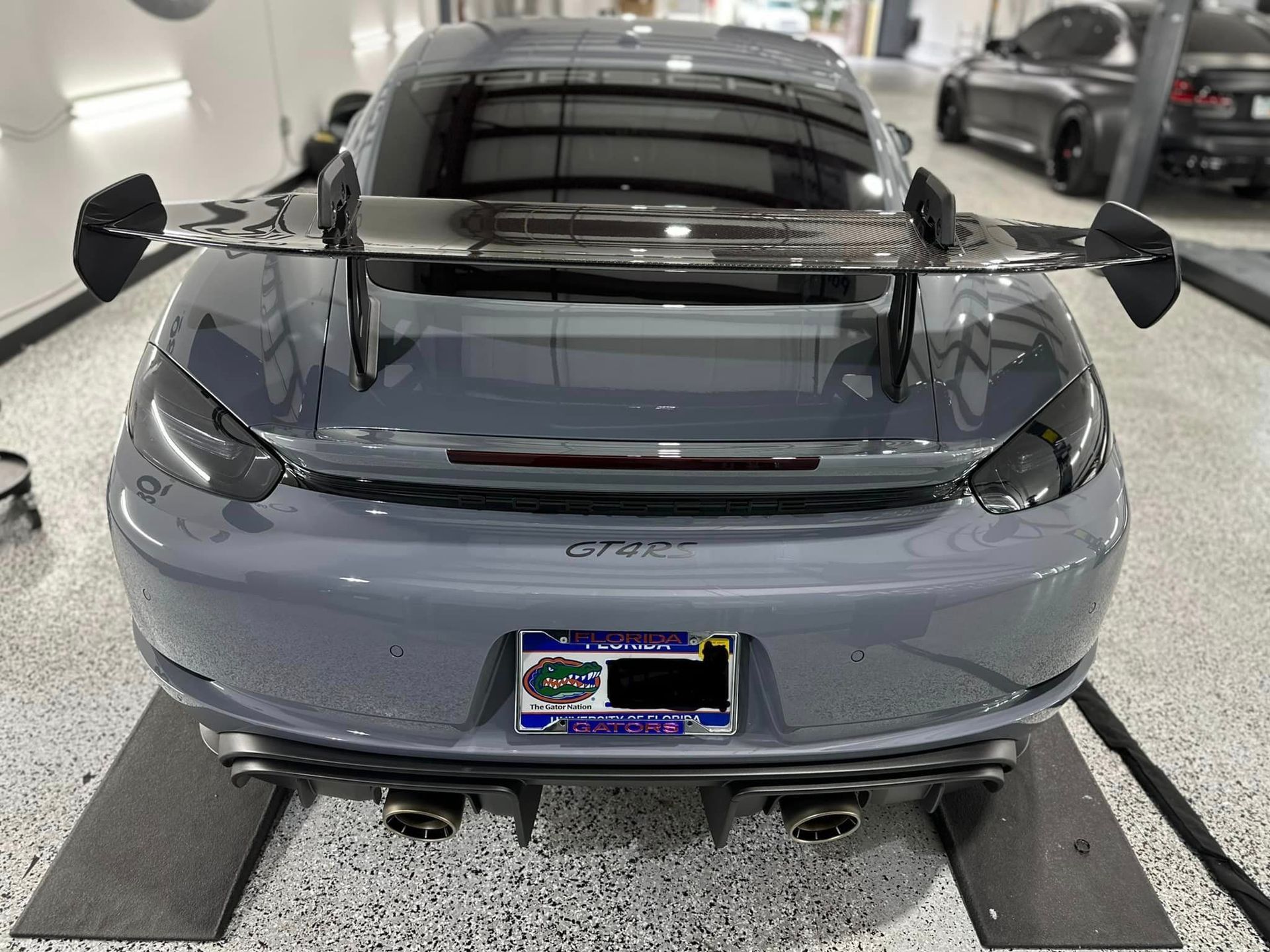 Porsche Cayman GT4 RS Wheels and Calipers Coated with Modesta BC06 High Heat Resistant Glass rear view close up Orlando, Florida