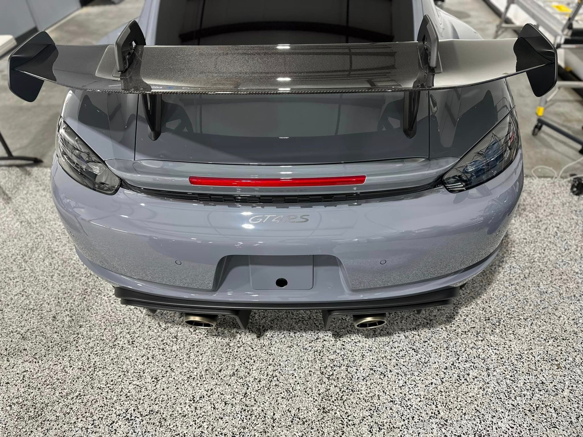 Porsche Cayman GT4 RS Wheels and Calipers Coated with Modesta BC06 High Heat Resistant Glass spoiler from above close up Florida USA