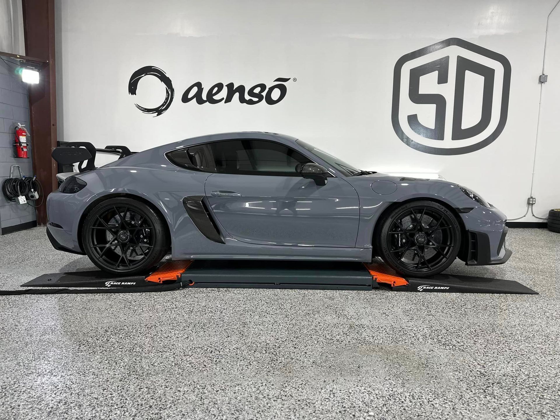 Porsche Cayman GT4 RS Wheels and Calipers Coated with Modesta BC06 High Heat Resistant Glass side view Orlando, FL