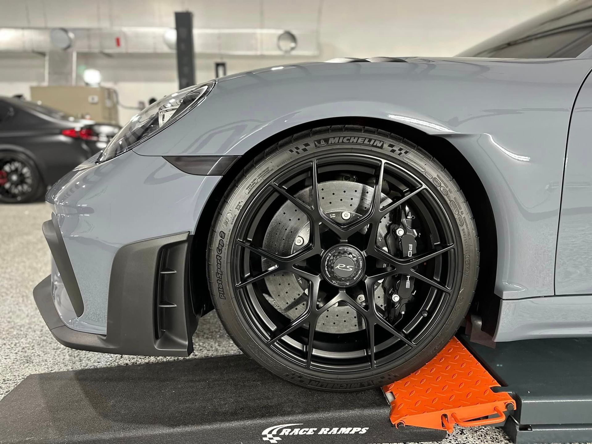 Porsche Cayman GT4 RS Wheels and Calipers Coated with Modesta BC06 High Heat Resistant Glass Wheel close up Orlando