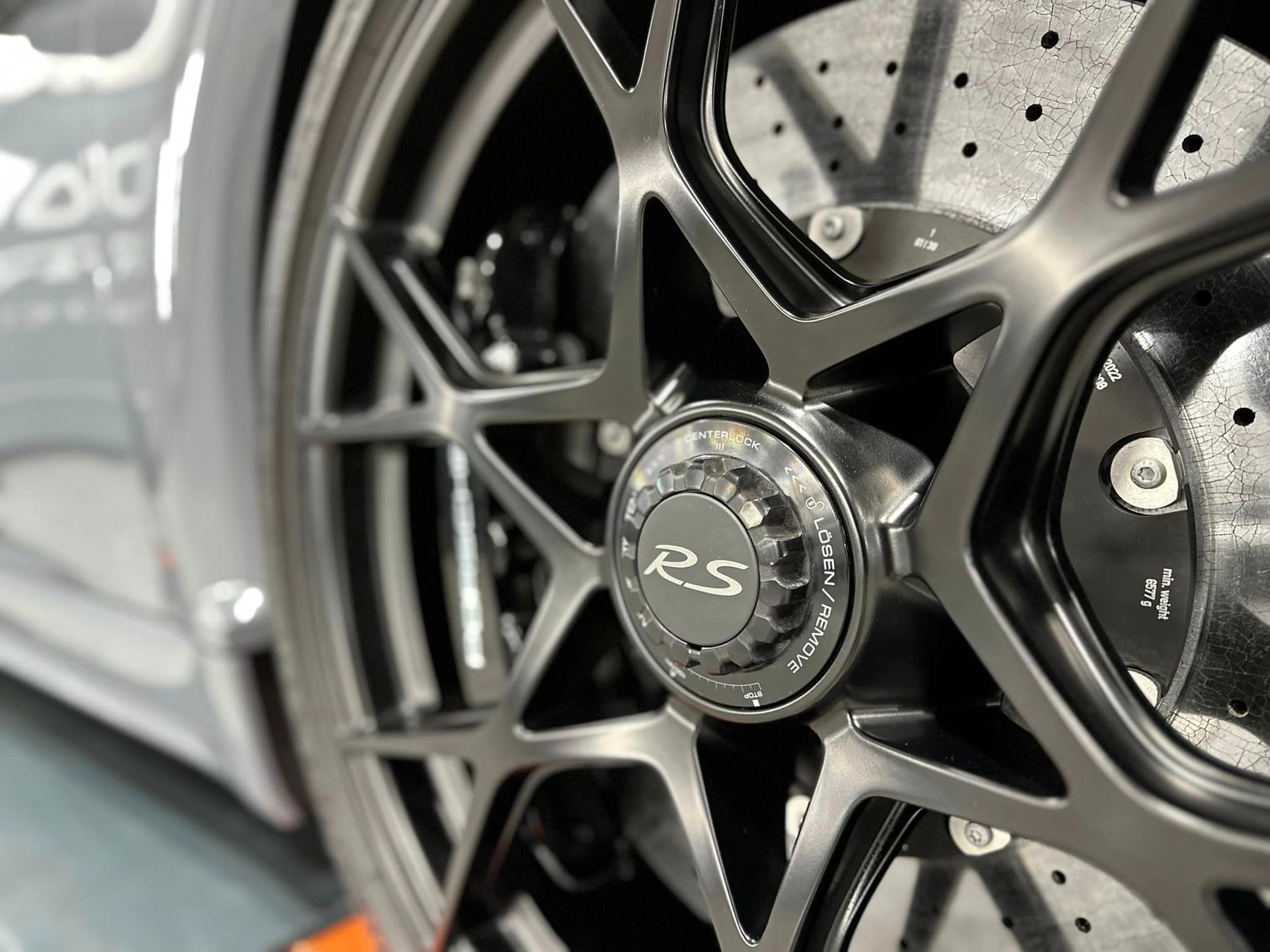 Porsche Cayman GT4 RS Wheels and Calipers Coated with Modesta BC06 High Heat Resistant Glass rim close up Orlando