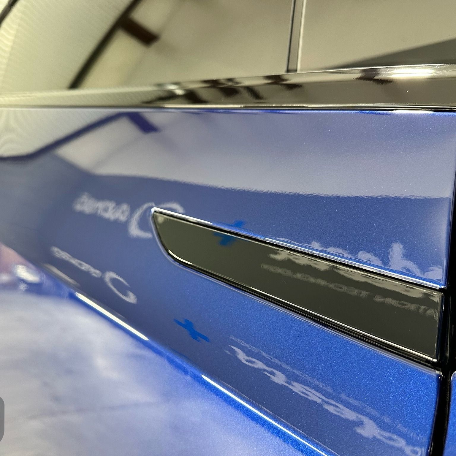 Tesla Model X Detailing, Full Body Paint Protection, and Modesta Coatings side panel close up Florida