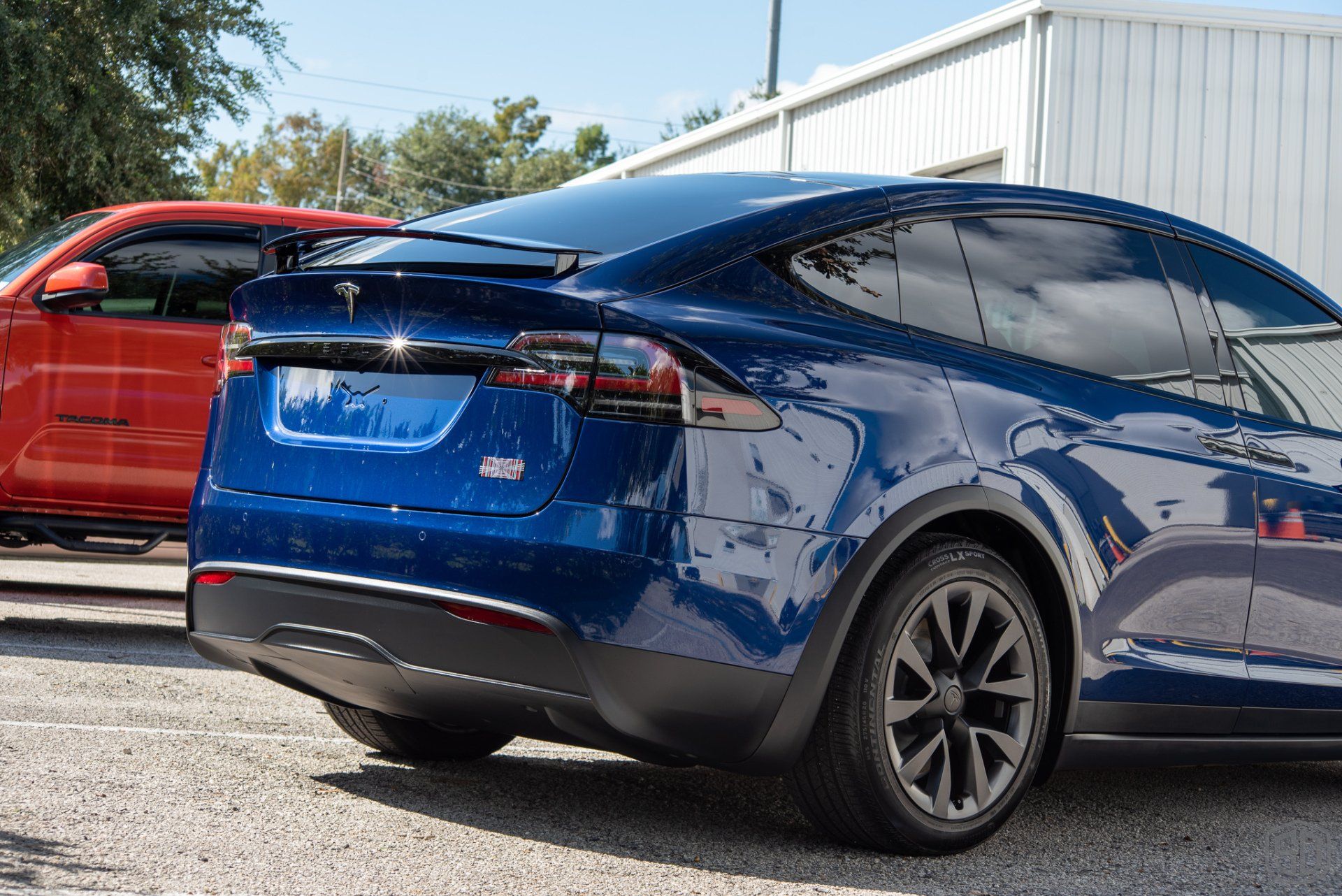 Tesla Model X Plaid Paint Correction Paint Protection Film Modesta Ceramic Glass Coating, Modesta Leather and Wheel Protection rear view Orlando
