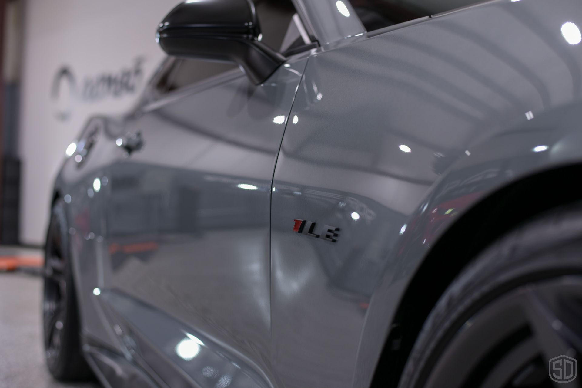 A close up of the side of a car with the word ls on it