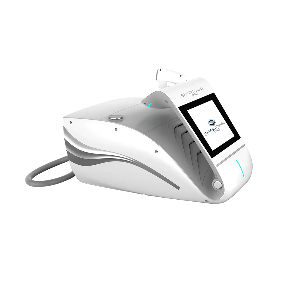 A white device with a black screen is sitting on a white surface.