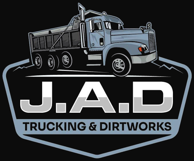 J.A.D. Trucking & Dirtworks logo: a blue dump truck over the company's name and tagline, all within a dark gray hexagonal border.