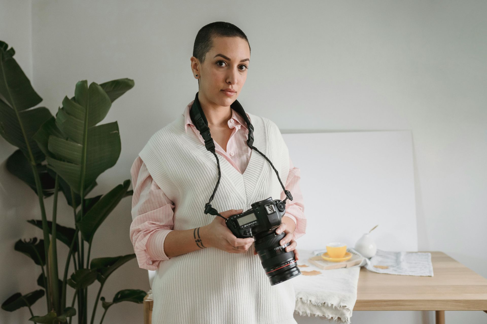Real estate photographer with camera
