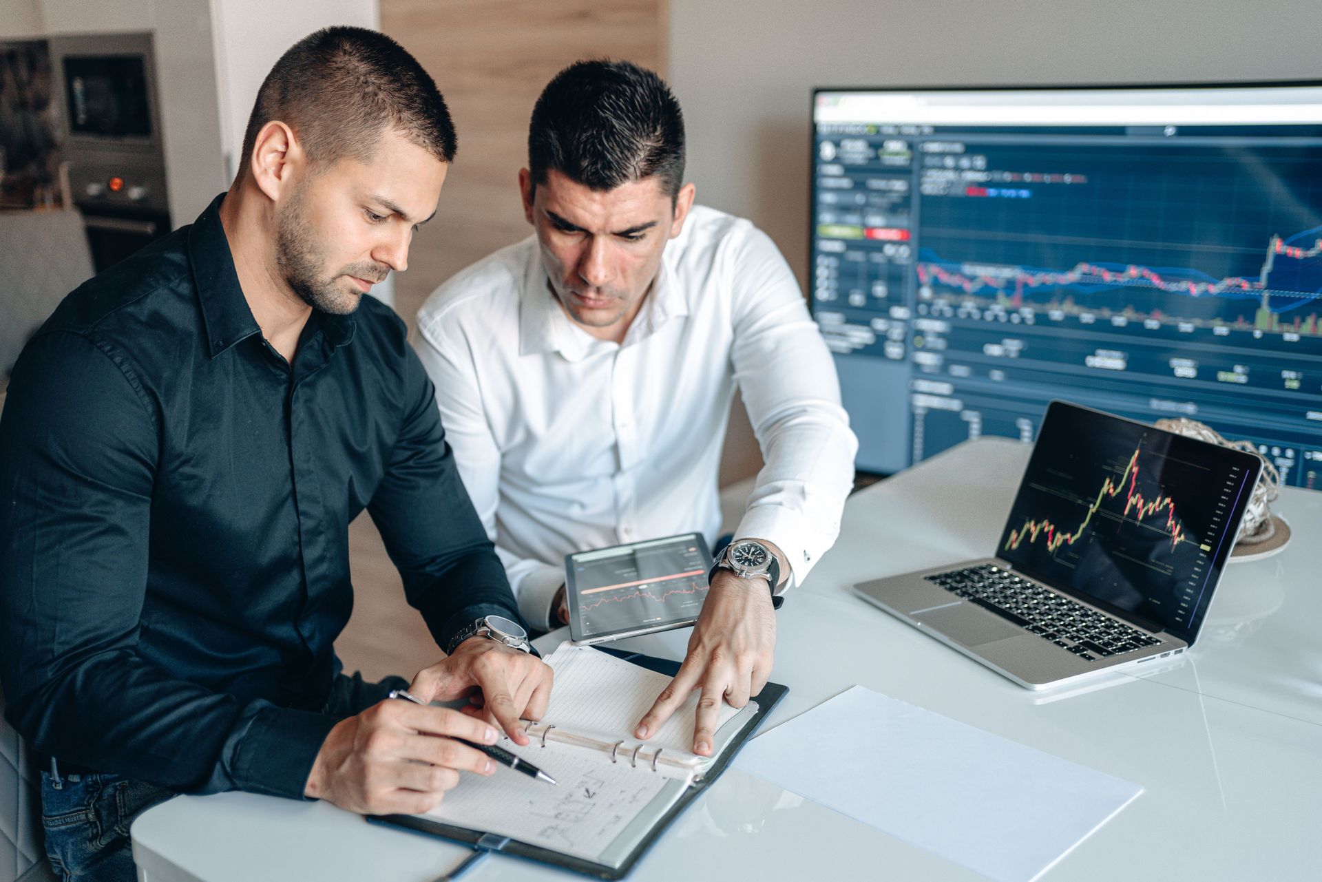 Two Property Managers conduct rental data analysis