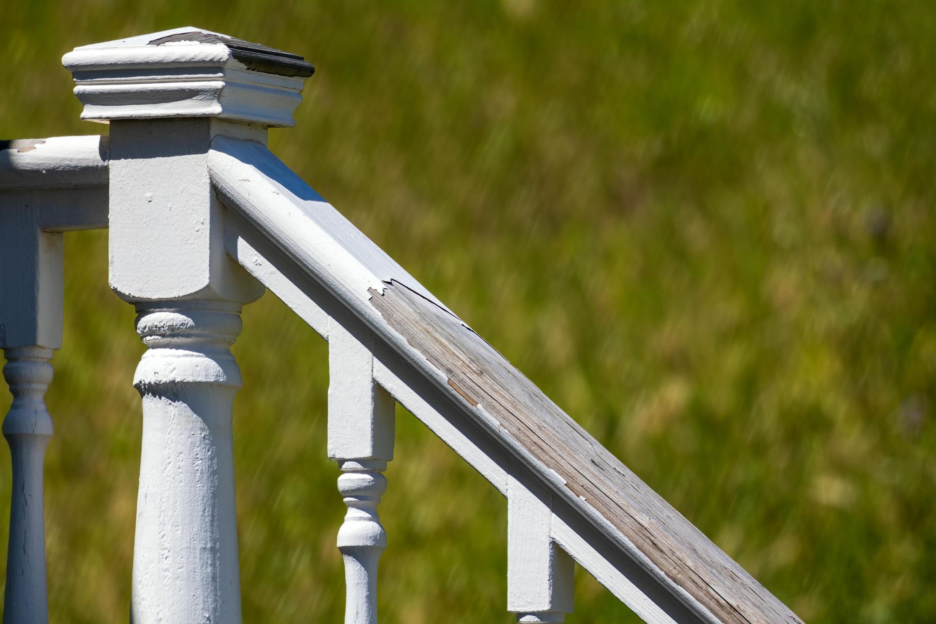 Worn paint on a patio banister