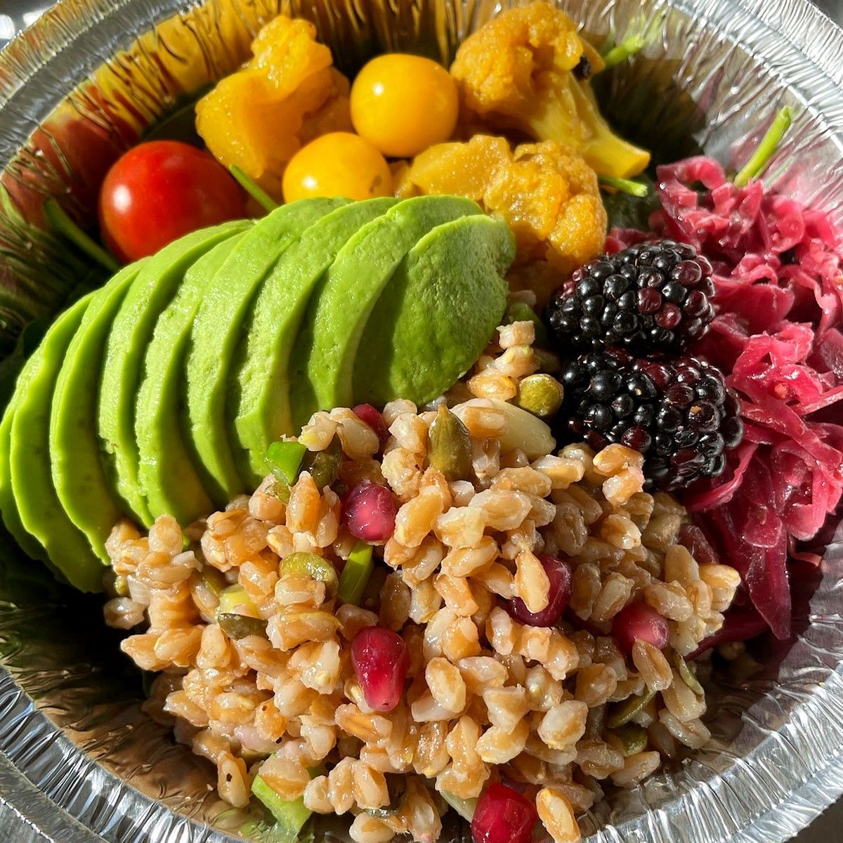 Organic grain bowl with avocado