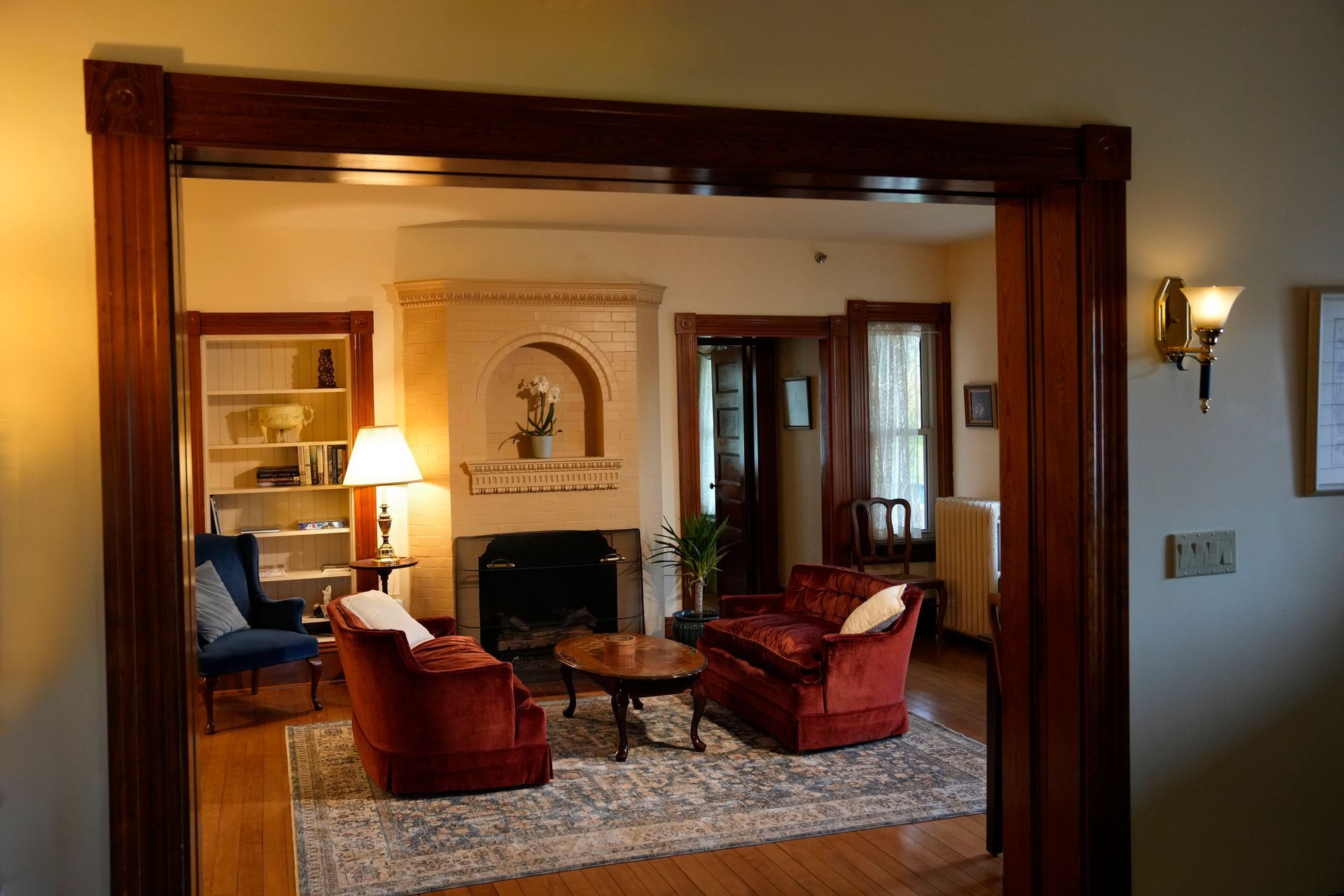 A living room filled with furniture and a fireplace