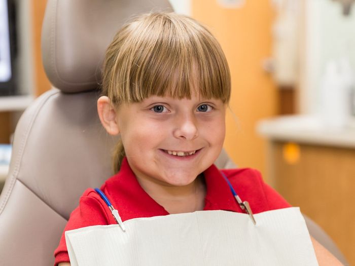 Boy Holding His Xtray Result - Bellville, OH - Clearfork Family Dentistry