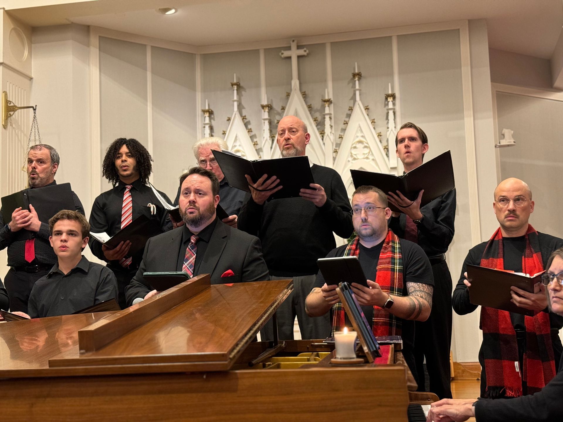 A choir sings in a church sanctuary