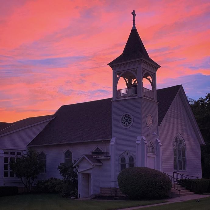 A church bell tower at sunset