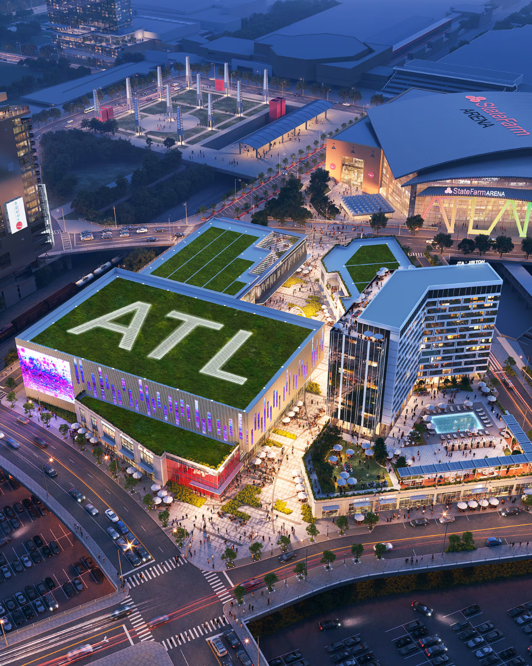 An aerial dusk rendering of a modern urban complex with a rooftop garden featuring