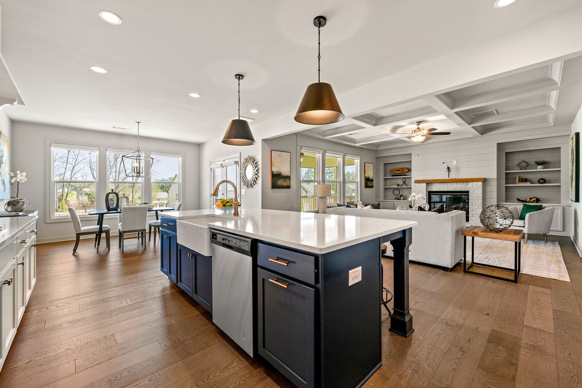 There is a large island in the middle of the kitchen.