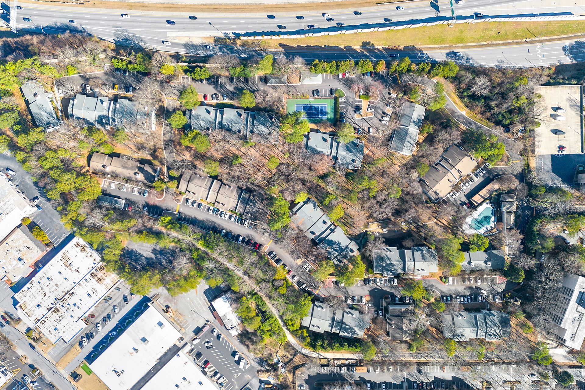 An aerial view of a city with a lot of buildings and trees.