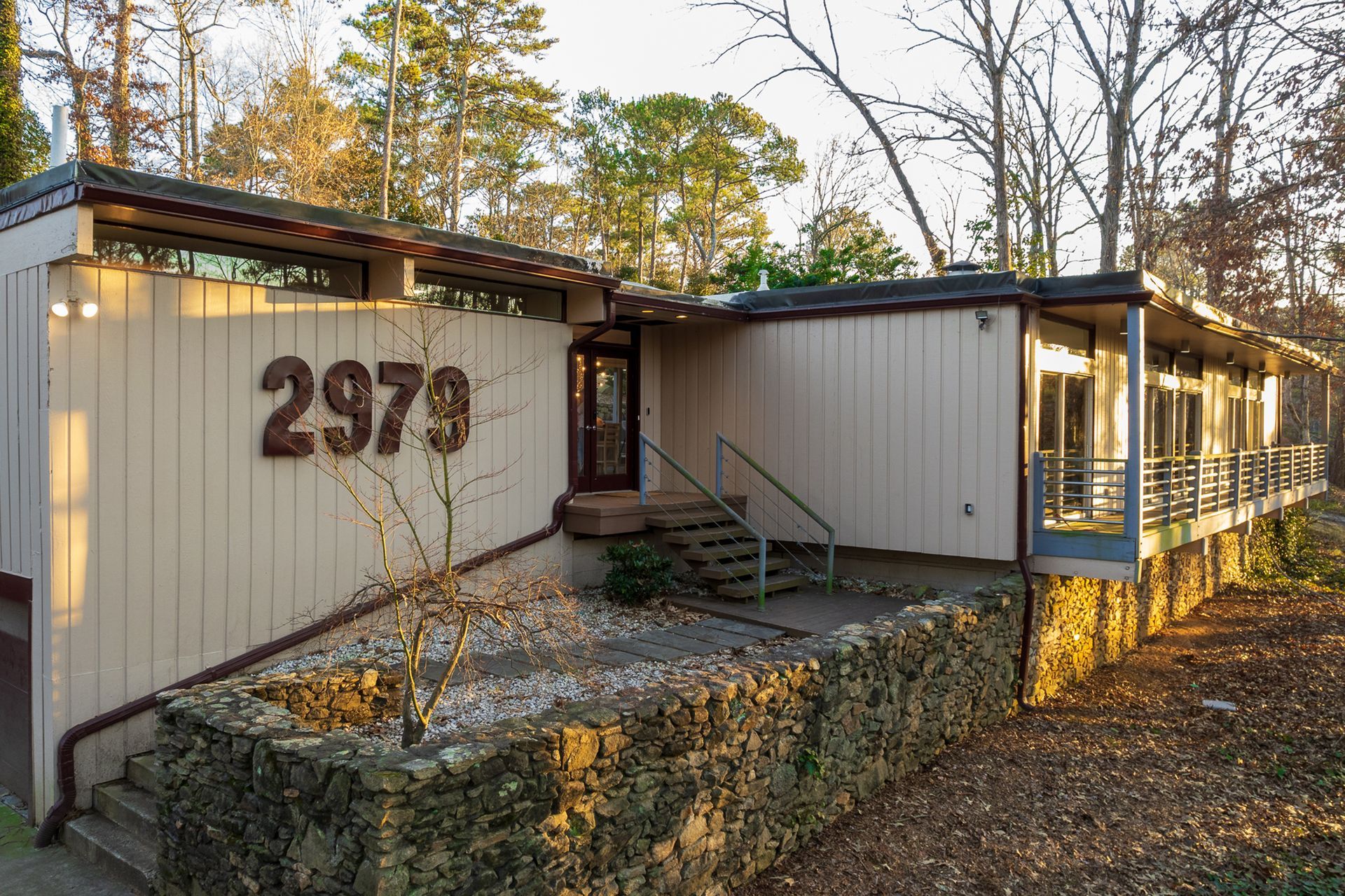 A house with the number 2979 on the side of it.
