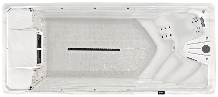 Overhead view of a white swim spa with jets and a filtration system.
