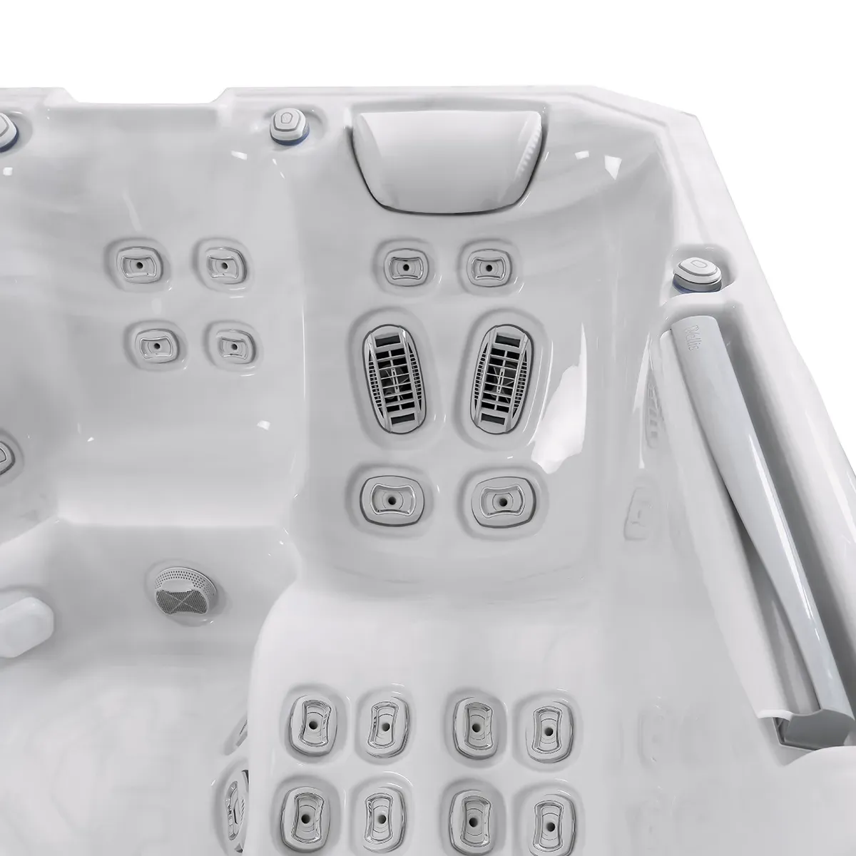 White hot tub interior with multiple jets and controls.