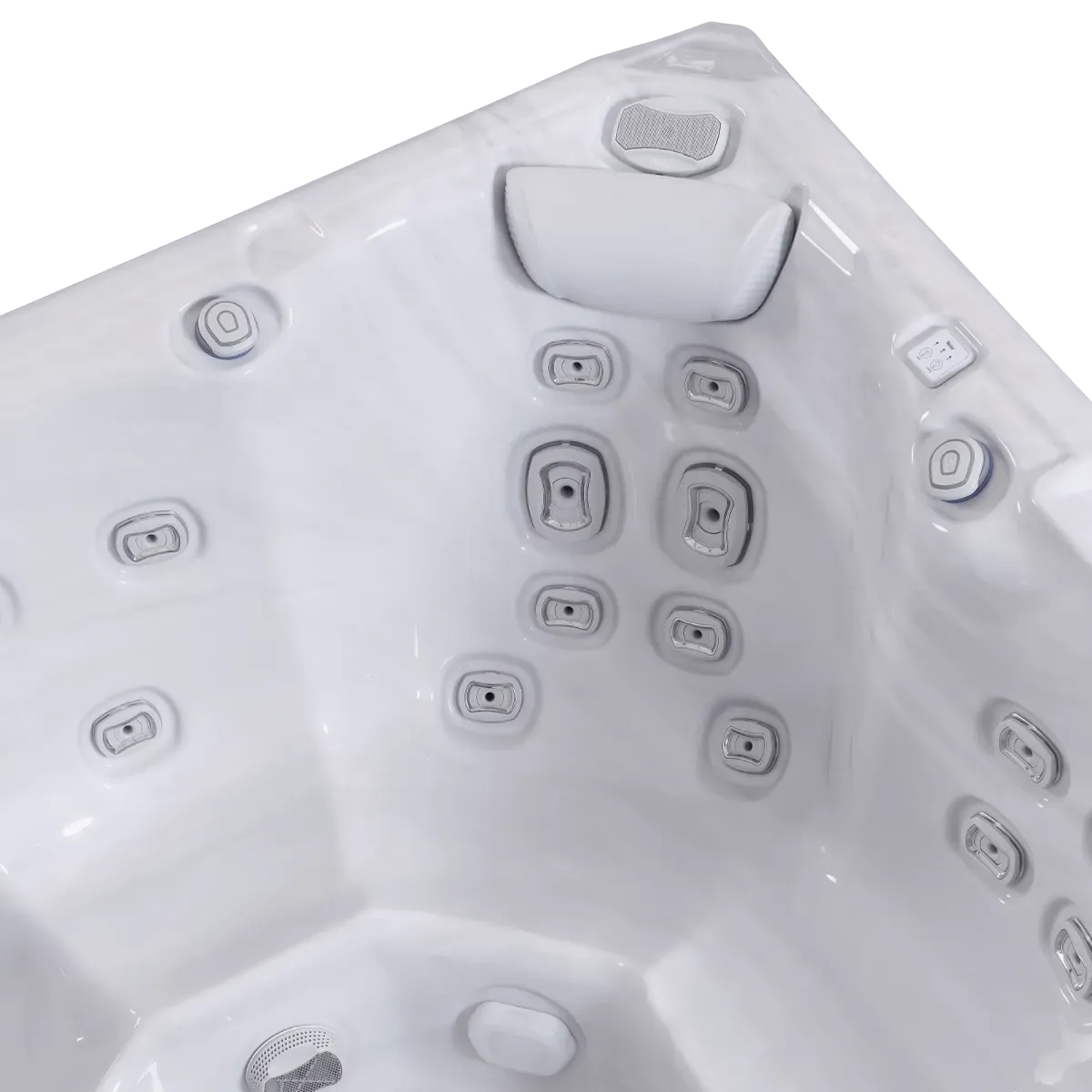 White hot tub interior with multiple jets and headrests.