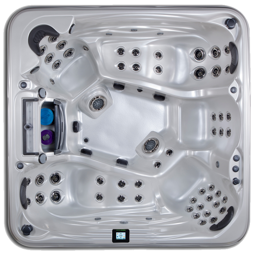 Top-down view of a white, multi-person hot tub with various jet configurations and control panel.