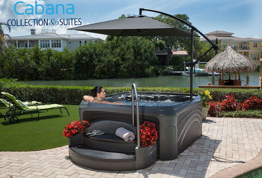 Woman in a hot tub outdoors, under a cantilever umbrella, near water. Cabana Collection & Suites logo.