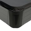 Corner of a black hot tub with a dark gray exterior and fitted cover.
