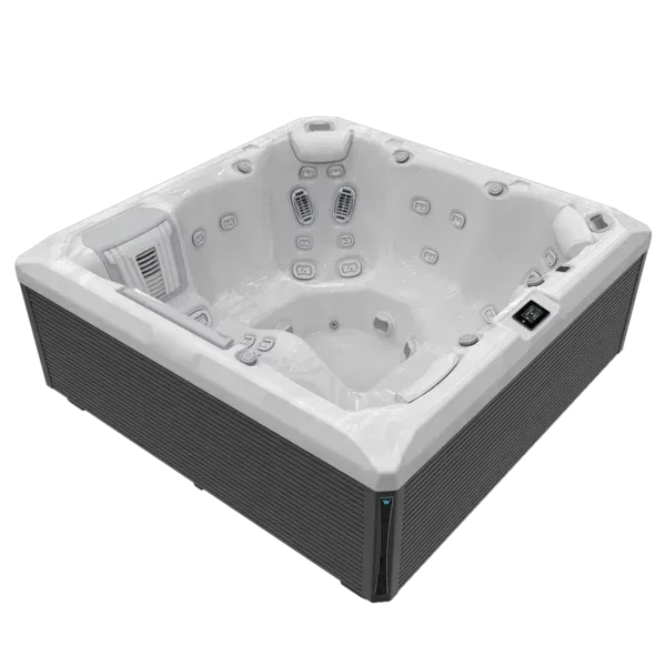 Square, grey-sided hot tub with a light-colored interior and multiple jet nozzles, outdoors.