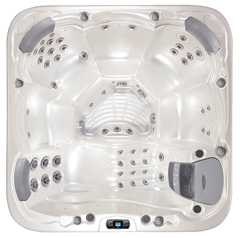 Top-down view of a light-colored, square hot tub with multiple jet configurations and seating areas.