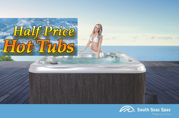 Hot tub sale. Woman in white swimsuit in hot tub on deck overlooking ocean.