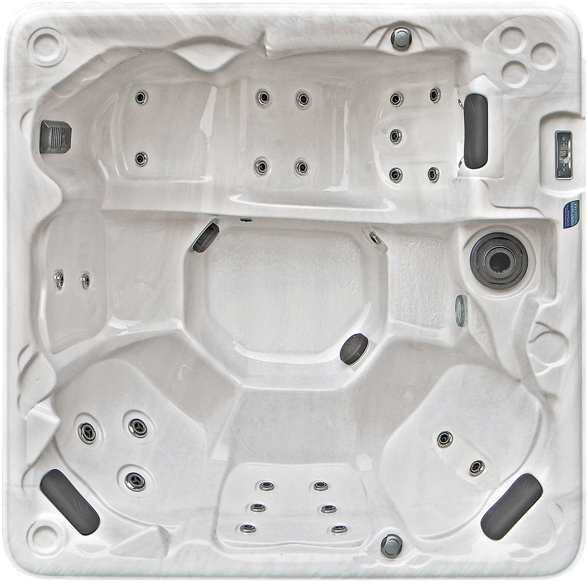 Overhead view of a white, multi-person hot tub with molded seating and multiple jets.