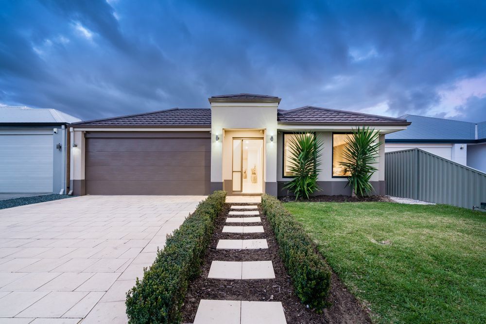 Modern single-story house with a pathway — Into Finance Lending Solutions in Coomba Bay, NSW