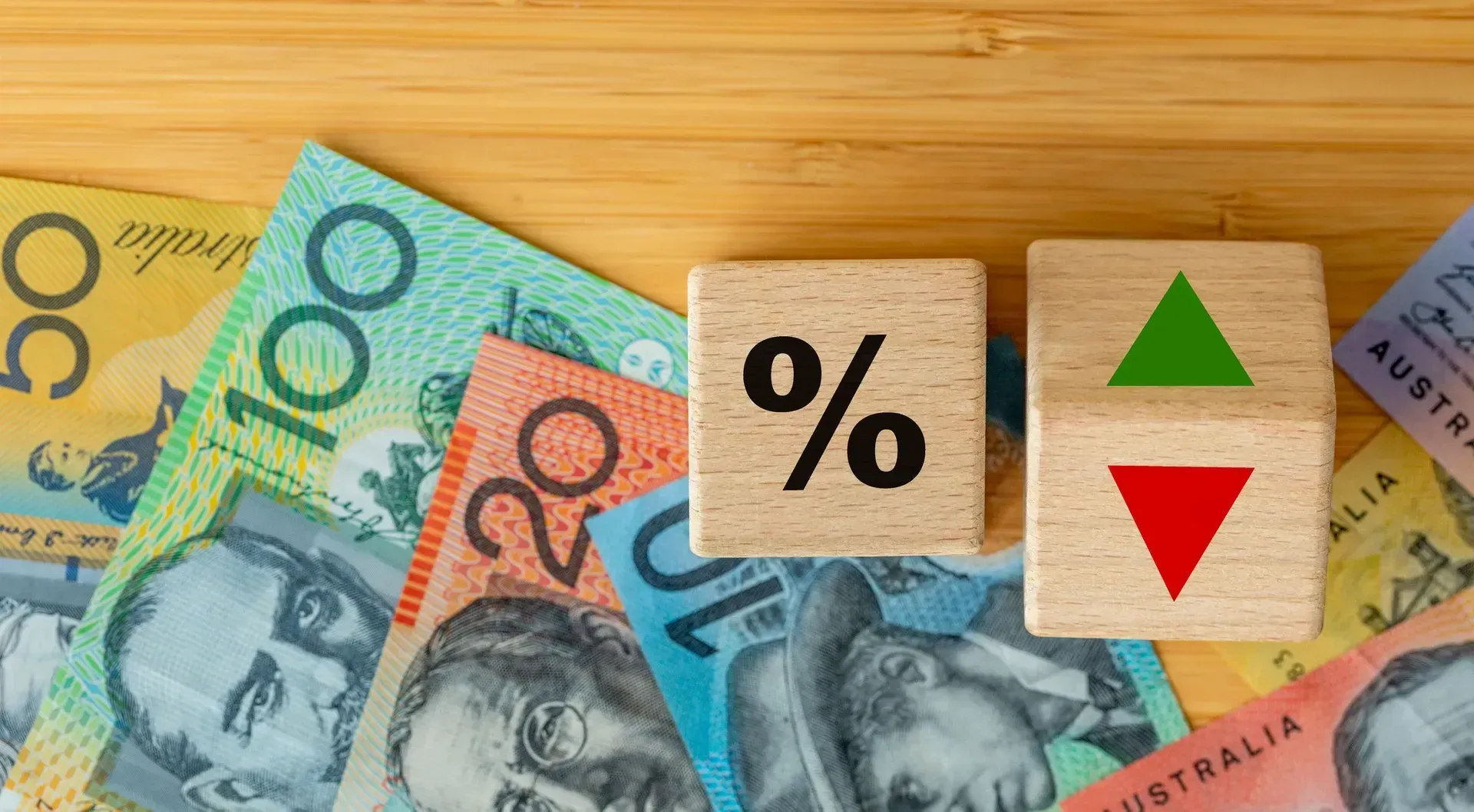 Australian Banknotes Next to Wooden Blocks — Into Finance Lending Solutions in Coomba Bay, NSW