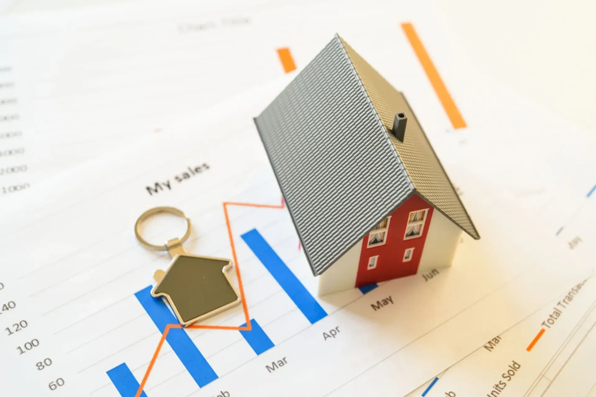 Toy House and Key on Top of a Graph — Into Finance Lending Solutions in Coomba Bay, NSW