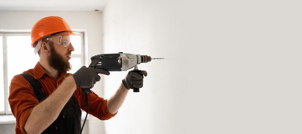 Construction Worker Wearing Hard Hat and Safety Glasses — Into Finance Lending Solutions in Nabiac, NSW