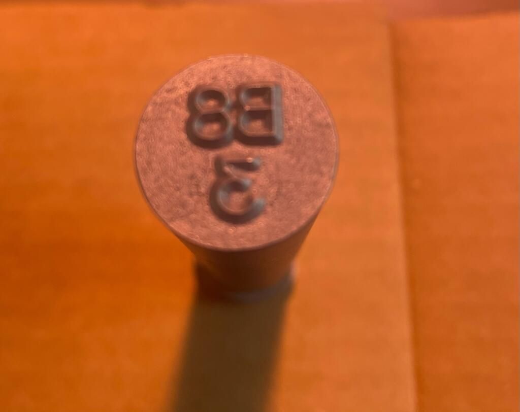 Metal stamp with 