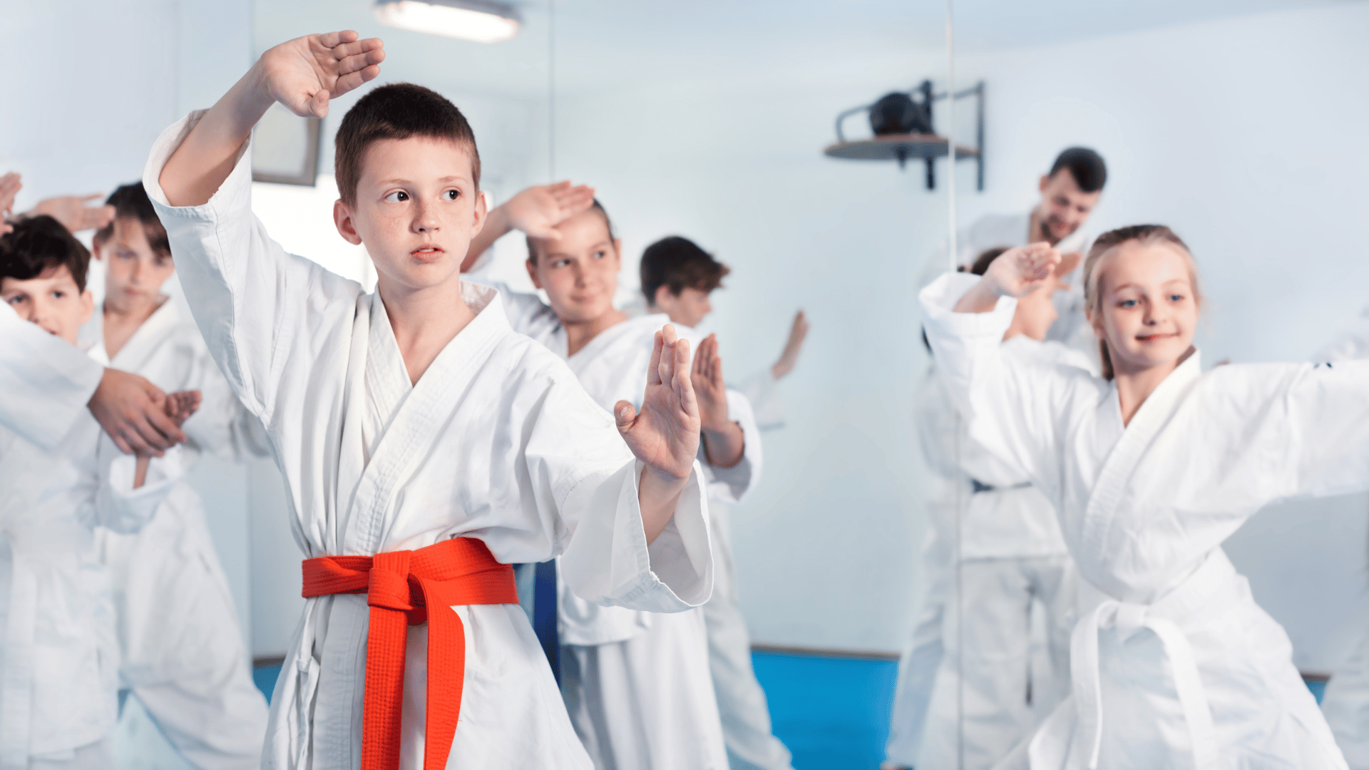 Beginner martial arts classes for adults and teens learning fundamental techniques in a welcoming training environment