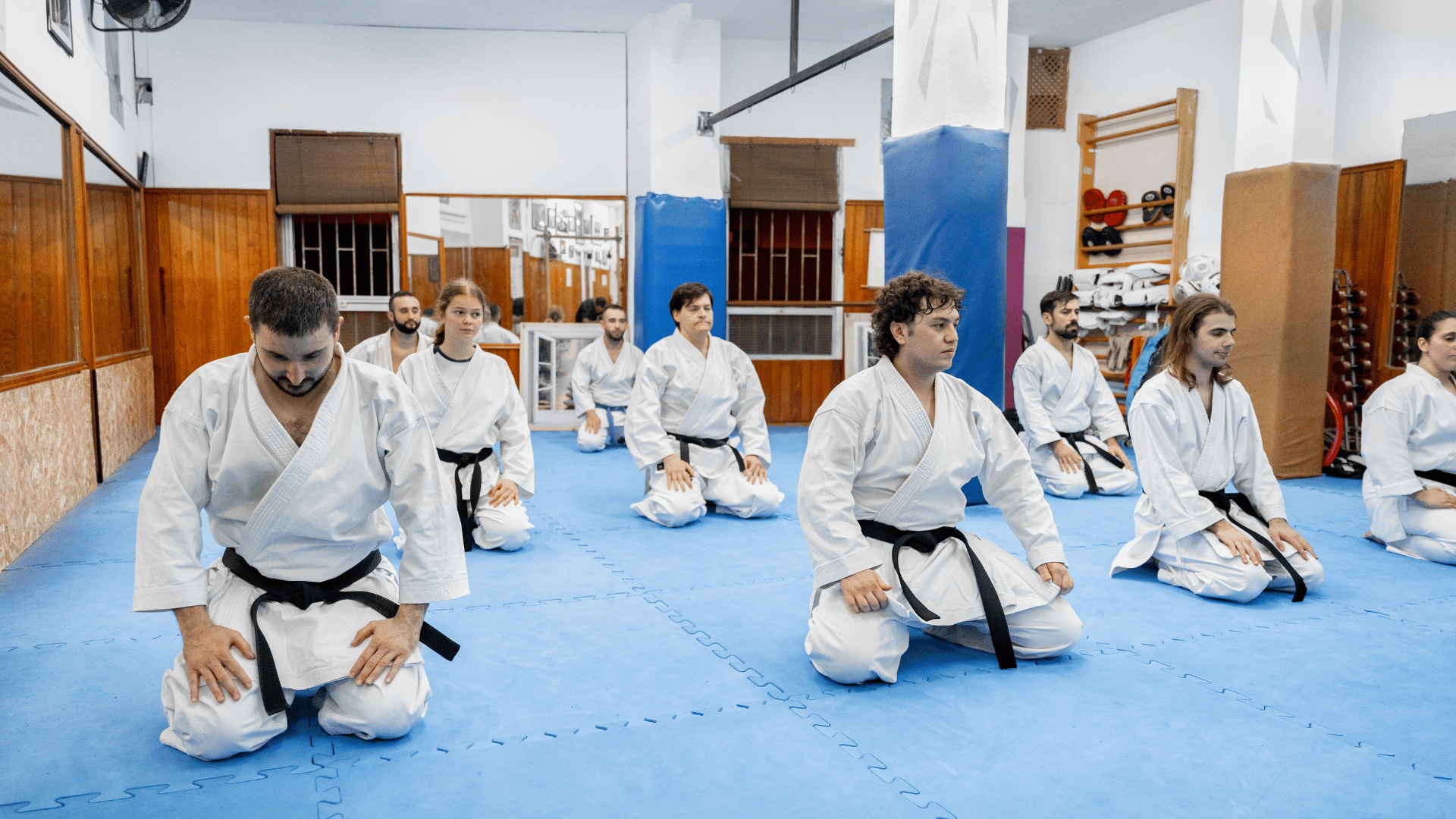 Traditional karate classes with students learning disciplined striking techniques, forms, and martial arts fundamentals in a dojo setting