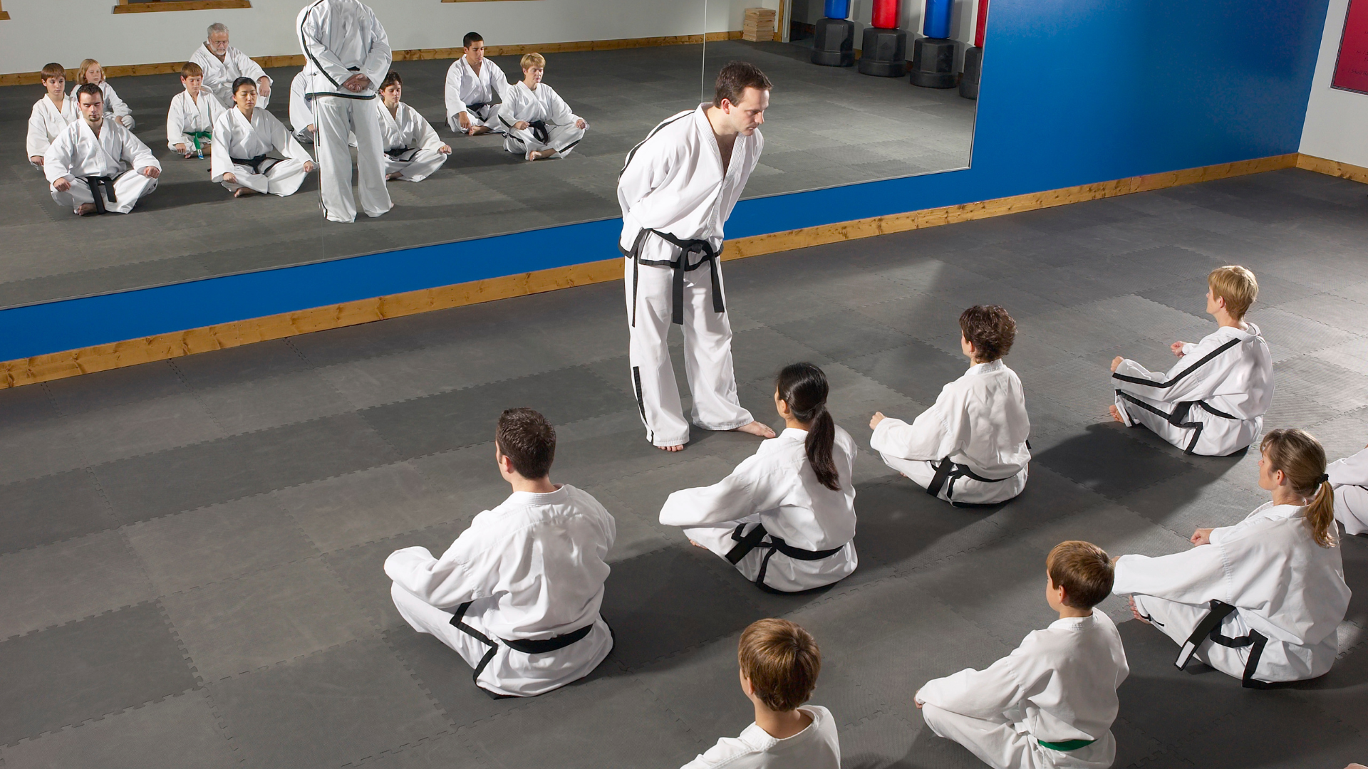 Kids martial arts classes with professional instructors teaching children safe techniques and physical skills in a supportive studio environment