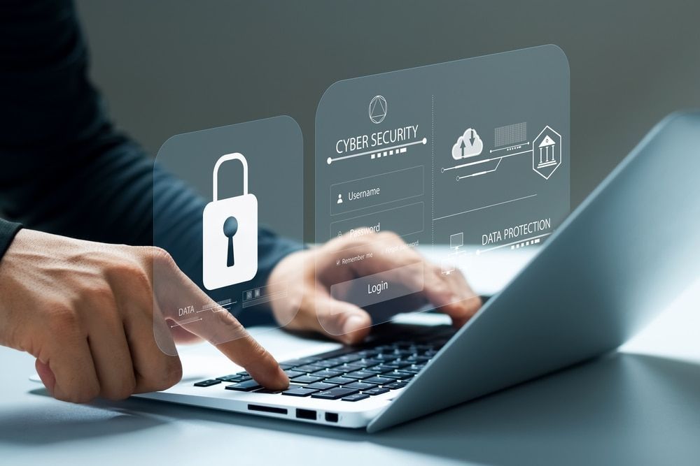 A Person Is Using A Laptop Computer With A Padlock On The Screen — Black Label I.T. in Garbutt, QLD