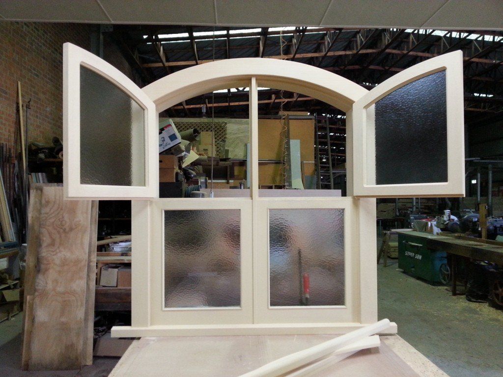 window with its upper flaps opened