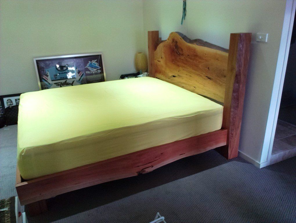 wood bed with mattress