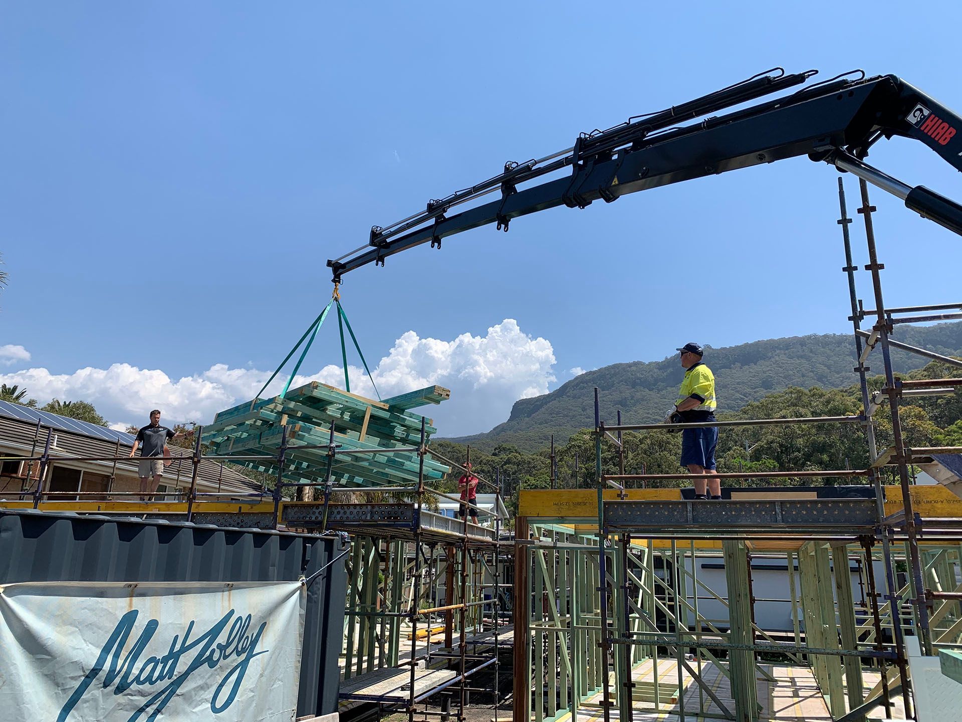 Unloading material using a crane